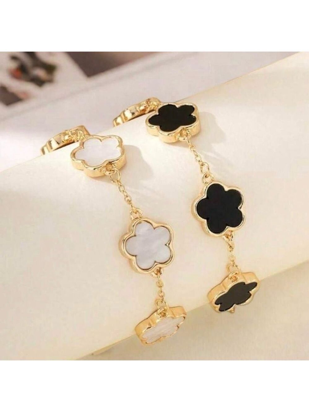 Elegant Gold and Black Flower Bracelet